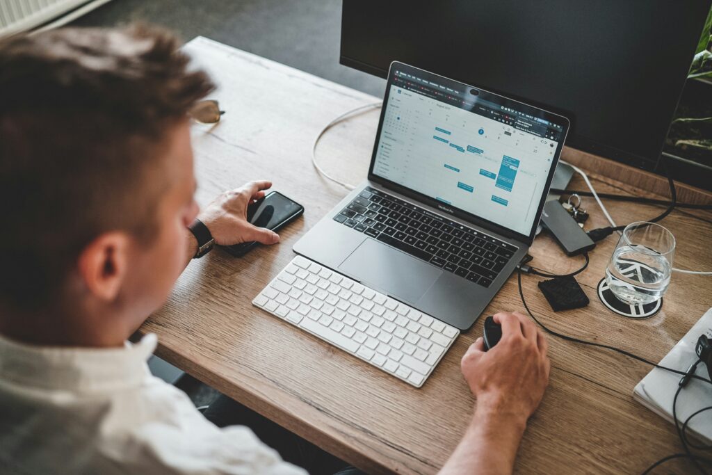 freelancer automating tasks with AI tools on laptop